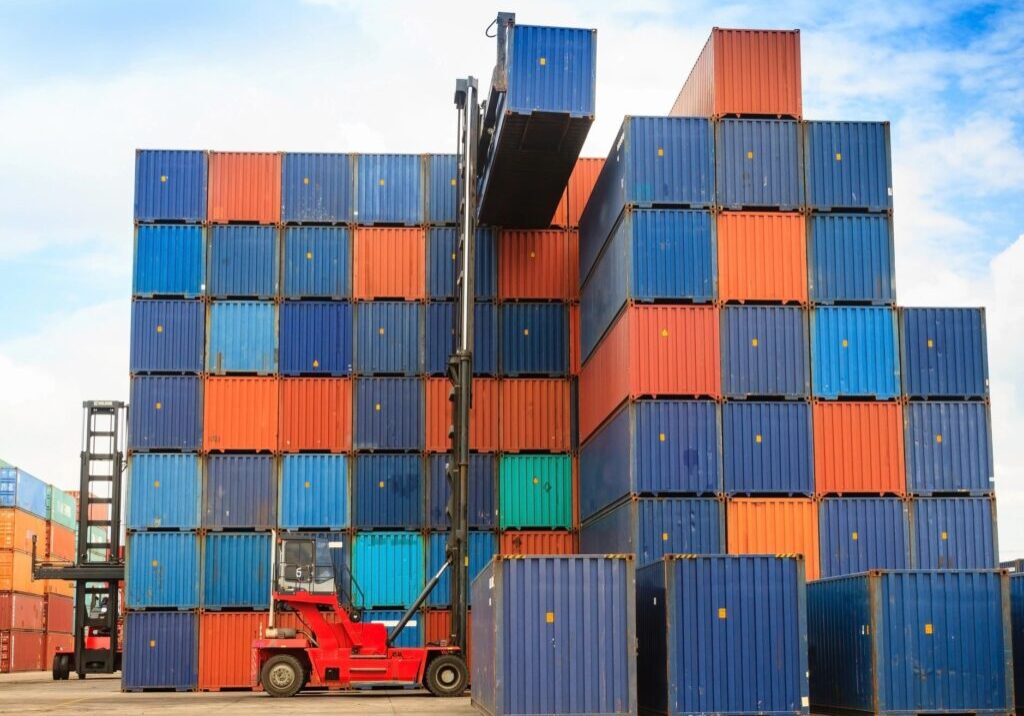 Forklift handling the container box